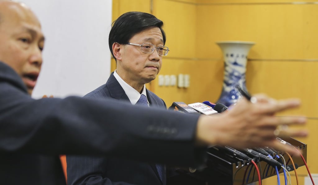 Secretary for Security John Lee Ka-chiu (centre) signed an agreement containing the new arrangements in Beijing. Photo: Dickson Lee