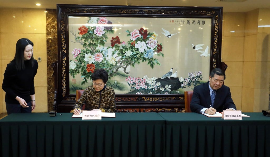 Hong Kong Chief Executive Carrie Lam (with National Development and Reform Commission chief He Lifeng) was on the second day of her three-day visit. Photo: Dickson Lee