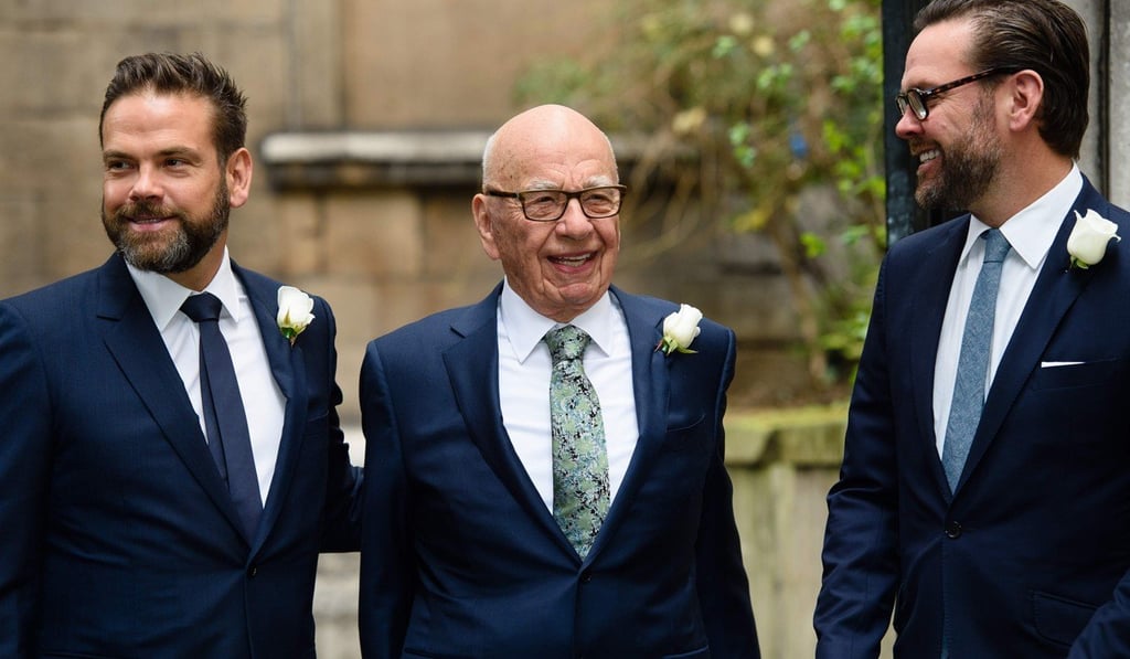 Rupert Murdoch (centre) flanked by his sons Lachlan (left) and James arriving at St Bride's church on Fleet Street in central London to attend a ceremony of celebration a day after the official marriage of Rupert Murdoch and former US model Jerry Hall. Photo: AFP Rupert Murdoch (centre) flanked by his sons Lachlan (left) and James arriving at St Bride's church on Fleet Street in central London to attend a ceremony of celebration a day after the official marriage of Rupert Murdoch and former US model Jerry Hall. Photo: AFP