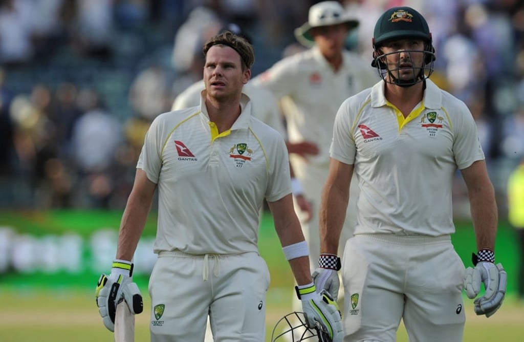 Australia's Steve Smith and Shaun Marsh leave the field at the end of play. Photo: AFP