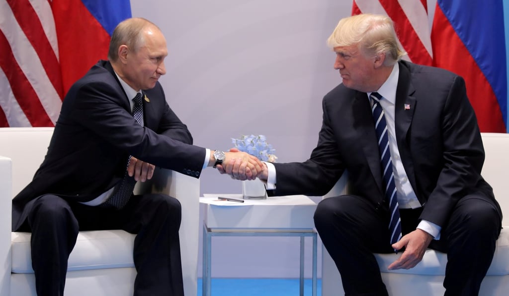 US President Donald Trump (right) shakes hands with Russia's President Vladimir Putin during their bilateral meeting at the G20 summit in Hamburg, Germany, on July 7. Photo: Reuters
