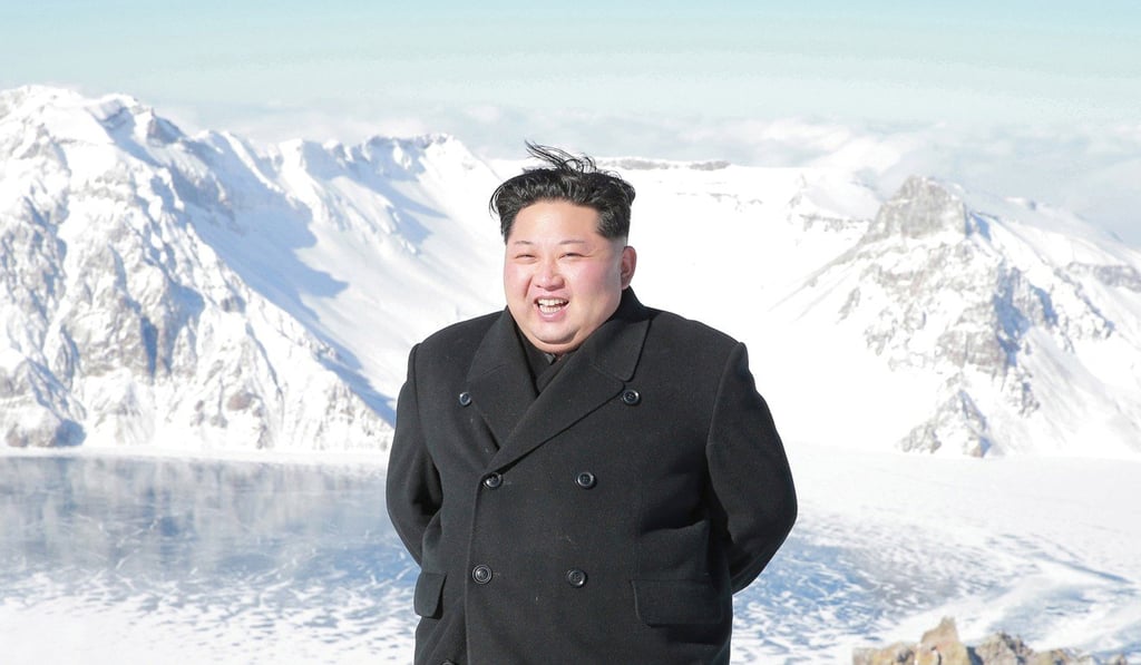 North Korean leader Kim Jong-un visits Mount Paektu in this photo released by the Korean Central News Agency on December 9. Observers have speculated that Kim’s trip to Paektu, a symbolic mountain in Korean history, was either in celebration of the country’s successful ICBM test in late November or a signal of a provocation to come. Photo: KCNA via Reuters