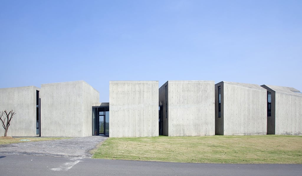 The Six-Room, a six-unit concrete building by artist Ai Weiwei, at Sifang Parkland outside Nanjing in China. The Six-Room, a six-unit concrete building by artist Ai Weiwei, at Sifang Parkland outside Nanjing in China.