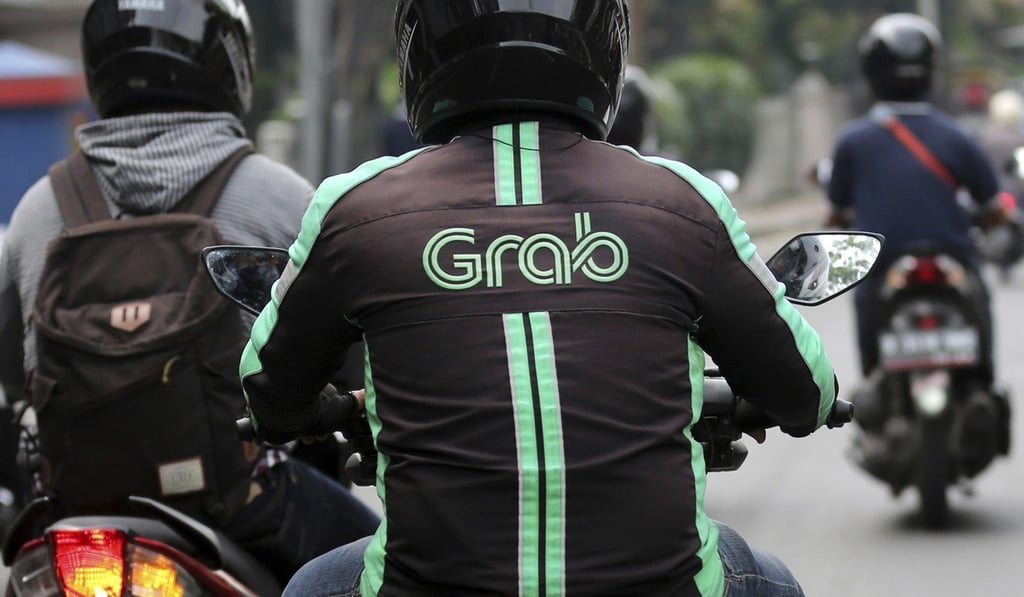 A GrabBike driver in Jakarta, Indonesia. Photo: AP
