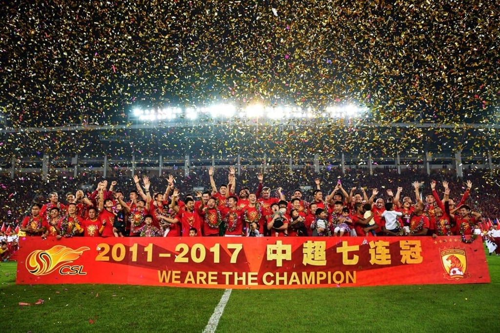 Guangzhou Evergrande celebrate winning the CSL for the seventh straight season. Photo: AFP