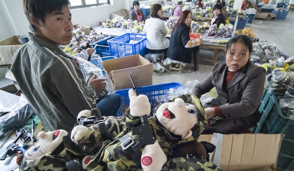 Workers at an electronic toy factory in Yiwu, on December 4, 2007.