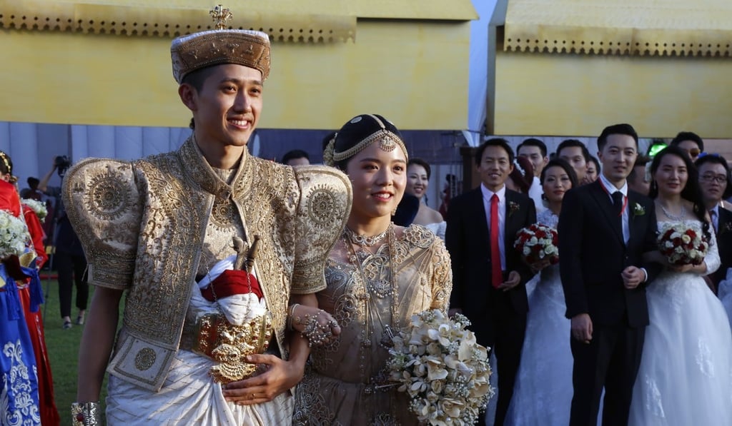 Some of the couples dressed in traditional clothing. Photo: EPA-EFE