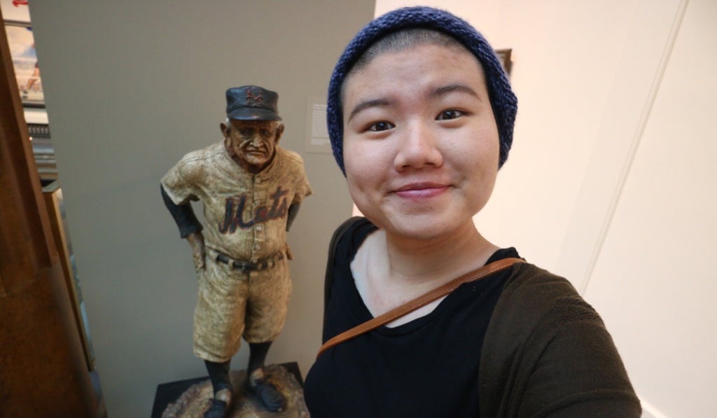 Mandy Yau's close friend Sharon Mak after she shaved her head to help Yau’s crowdfunding campaign.