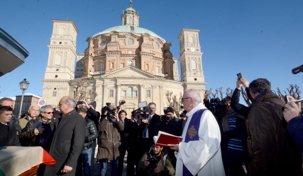 The coffin arrives at the Sanctuary of Vicoforte in Italy. Photo: AP