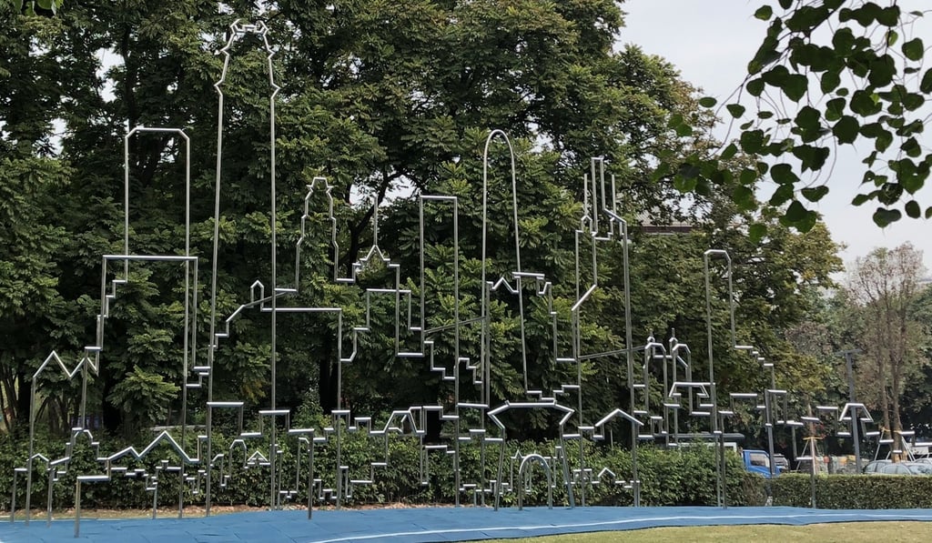 The Arena (2017), Yin Xiuzhen, a steel monkey bar in the shape of the Shenzhen skyline, greets visitors to the biennale. Photo: Enid Tsui