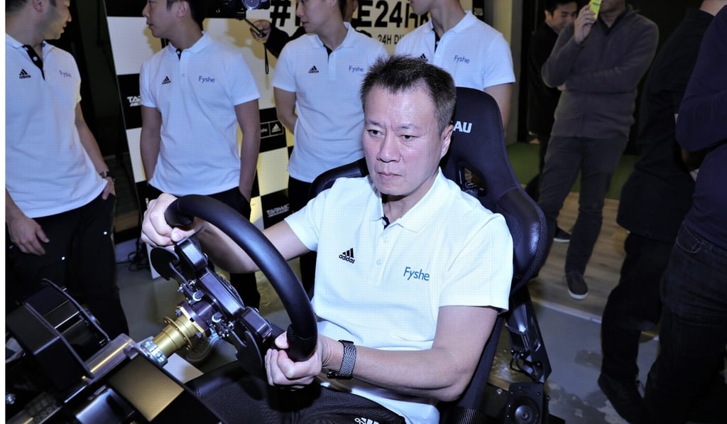 Charles Kwan shows off his skills in a simulator at the Phoenix Racing Asia headquarters in Chai Wan. Charles Kwan shows off his skills in a simulator at the Phoenix Racing Asia headquarters in Chai Wan.