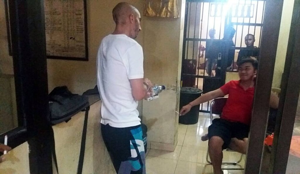 Recaptured US prisoner Christian Beasley inside a detention room in Badung Police headquarters in Bali. Photo: EPA Recaptured US prisoner Christian Beasley inside a detention room in Badung Police headquarters in Bali. Photo: EPA