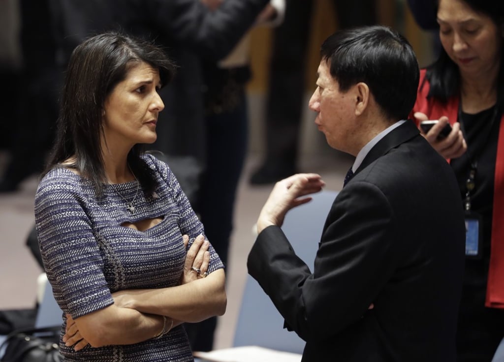 US Ambassador to the United Nations Nikki Haley (left) talks with Chinese deputy ambassador Wu Haitao at UN headquarters in New York on Friday. Photo: AP US Ambassador to the United Nations Nikki Haley (left) talks with Chinese deputy ambassador Wu Haitao at UN headquarters in New York on Friday. Photo: AP