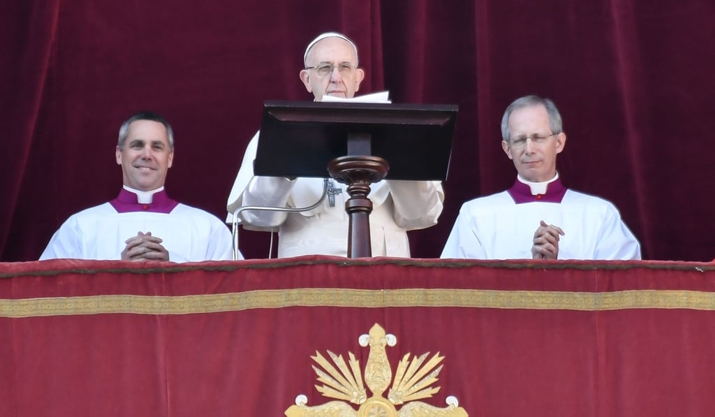 Pope Francis speaking from the balcony of St Peter's basilica during the traditional “Urbi et Orbi” Christmas address. Photo: AFP