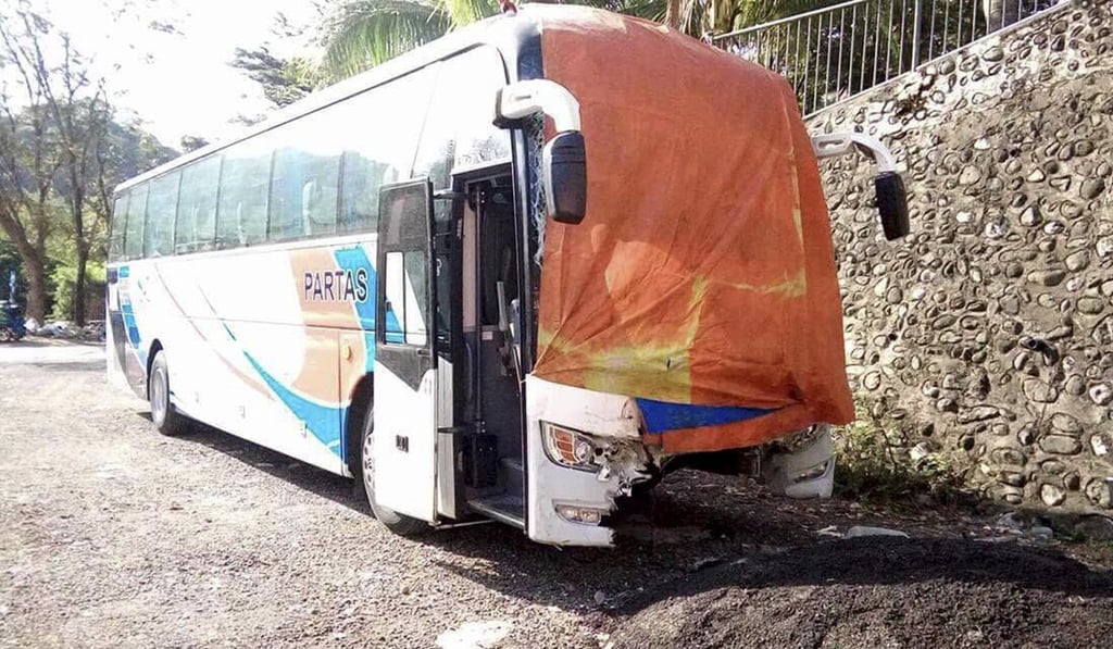 The damaged Partas coach. Photo: AP