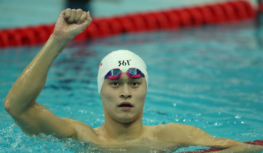 Sun Yang celebrates winning the 800m freestyle swimming final at the 13th Chinese National Games. Photo: Xinhua