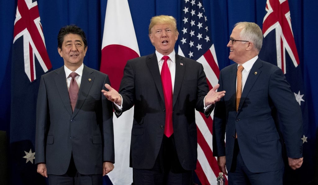US President Donald Trump joins Japanese Prime Minister Shinzo Abe and Australian Prime Minister Malcolm Turnbull in speaking to reporters during the Asean Summit in Manila on November 13. Australia, the US and Japan (along with India) have had talks on forming “the Quad”, a four-nation security partnership to counter China’s growing influence in the Asia-Pacific. Photo: AP