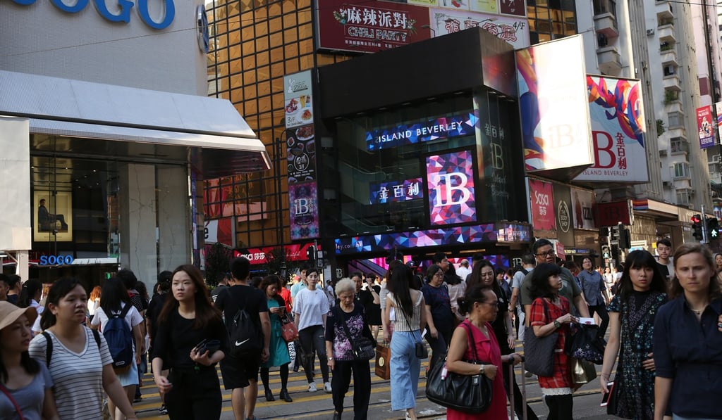 Pedestrians on a busy street in Causeway Bay. Photo: Sam Tsang