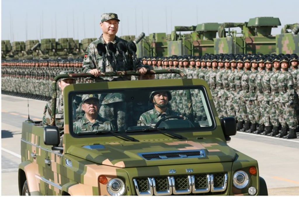 President Xi Jinping inspects troops during a parade marking the PLA’s 90th anniversary in July. China’s armed police will now report to the top military chiefs. Photo: Xinhua
