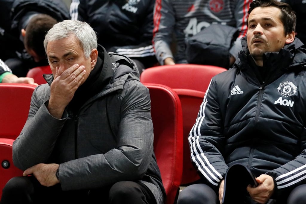 Jose Mourinho and assistant manager Rui Faria watch on as United are knocked out of the League Cup by Bristol City. Photo: Reuters