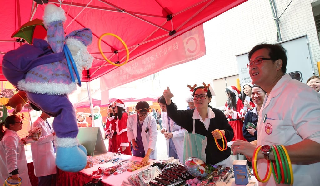 The Christmas party featured game booths set up in the open space at the hospital’s fourth floor. Photo: David Wong