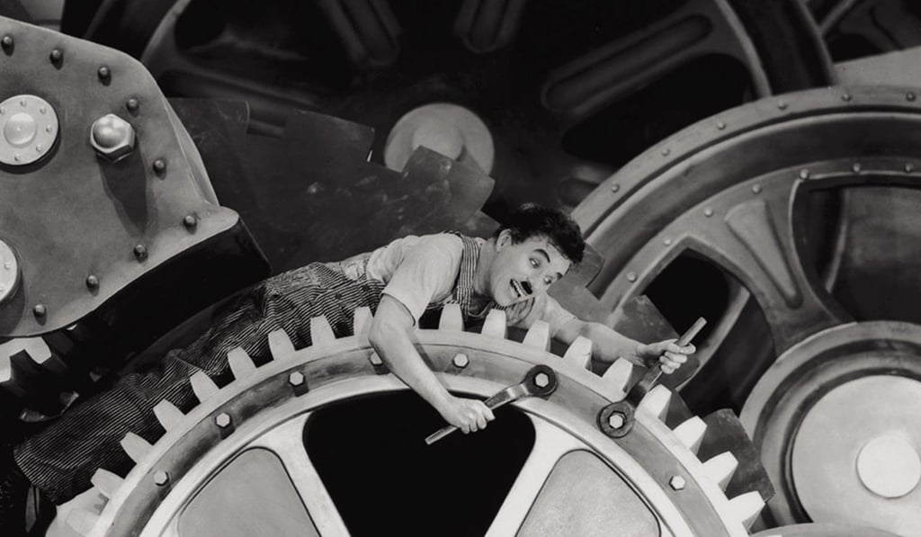 Charlie Chaplin is shown in a scene from his last silent film Modern Times. Photo: AP/The Roy Export Company Establishment, HO
