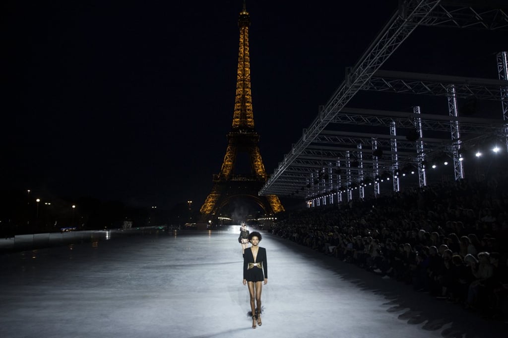 Saint Laurent models with the Eiffel Tower as a backdrop. Photo: EPA