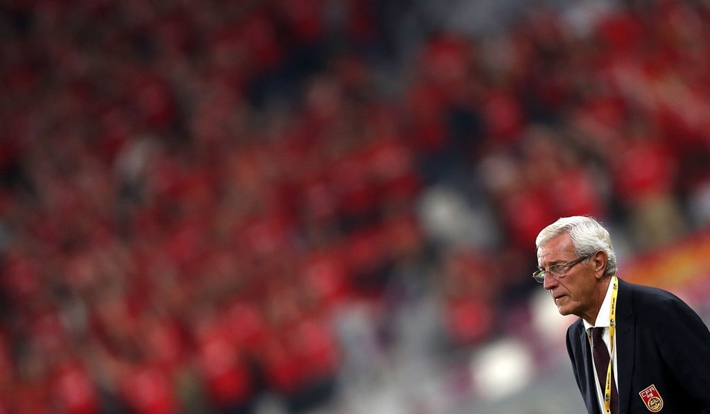 Head coach Marcello Lippi watches China’s final 2018 World Cup qualifying game against Qatar. Photo: AFP