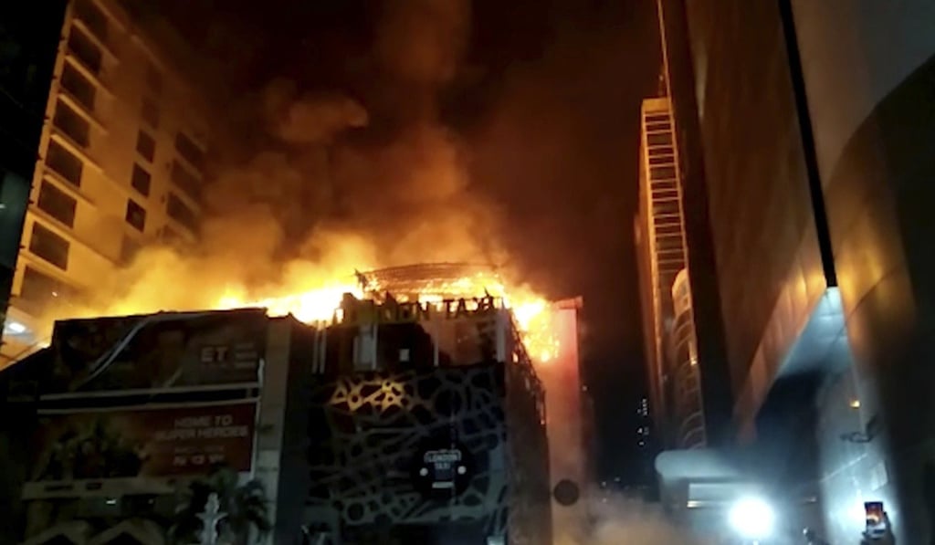 The fire that broke out in a rooftop restaurant in Mumbai. Photo: AP The fire that broke out in a rooftop restaurant in Mumbai. Photo: AP