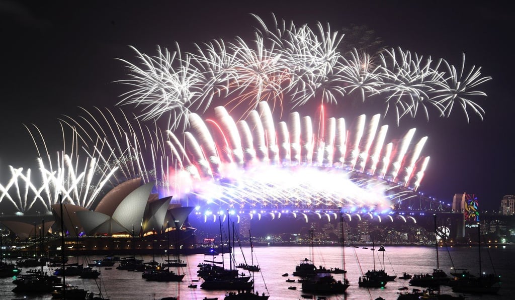 Fireworks explode over the Sydney Harbour during New Year's Eve celebrations in Sydney. Photo: EPA