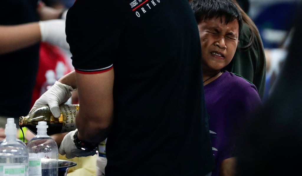 A boy being treated at a hospital in Manila. Photo: EPA