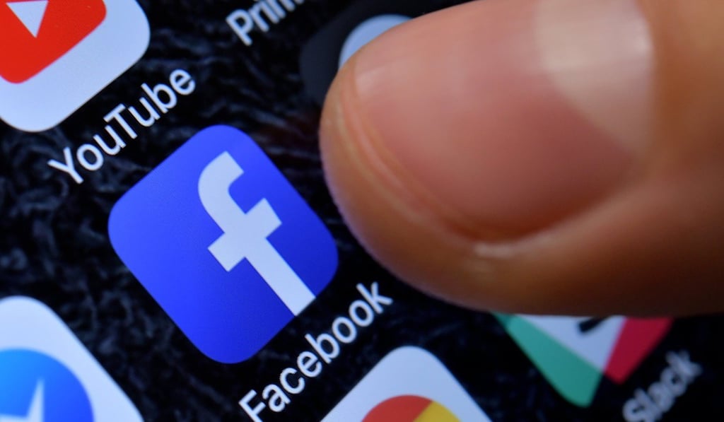 A close-up image showing the Facebook app on an iPhone. Photo: EPA