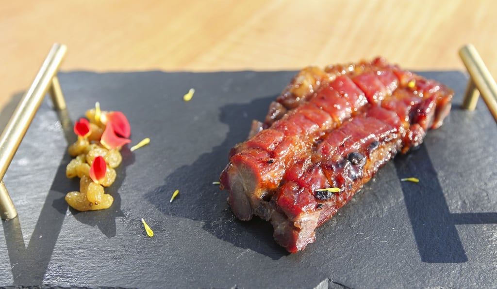 Roasted Iberico pork with honey sauce. Photo: Roy Issa