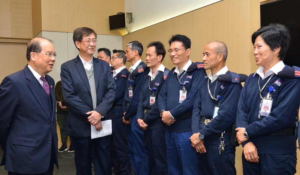 Matthew Cheung visiting guards at government headquarters. Photo: Handout Matthew Cheung visiting guards at government headquarters. Photo: Handout