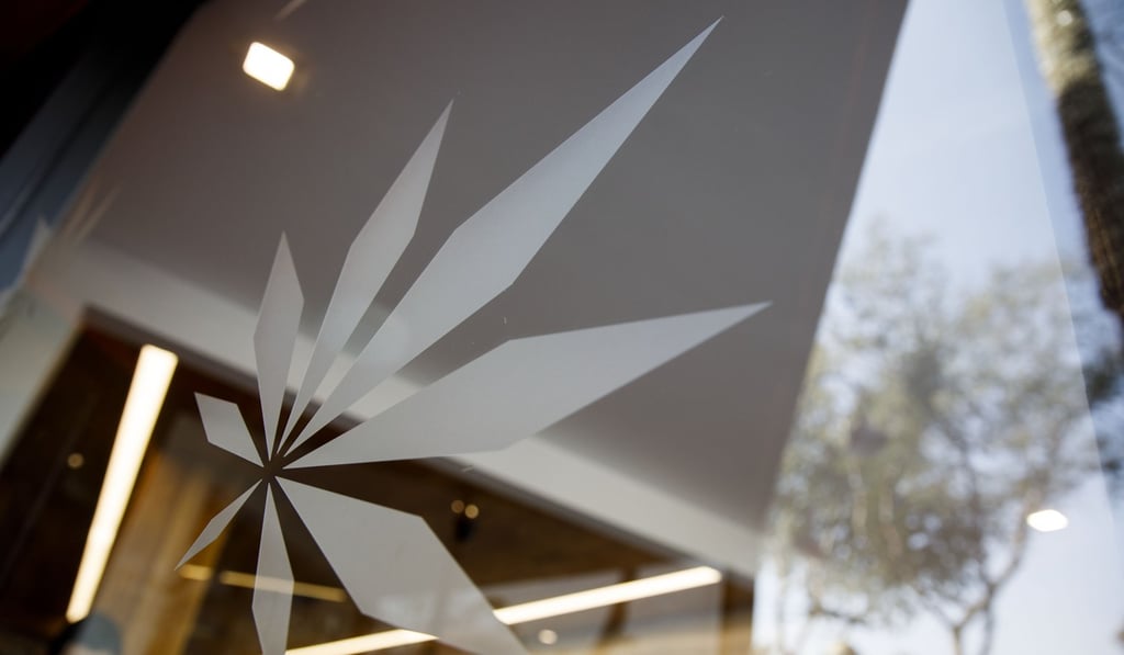 A marijuana leaf design is seen in the window of the MedMen dispensary in West Hollywood, California. The state legalised recreational marijuana on January 1. Photo: Bloomberg
