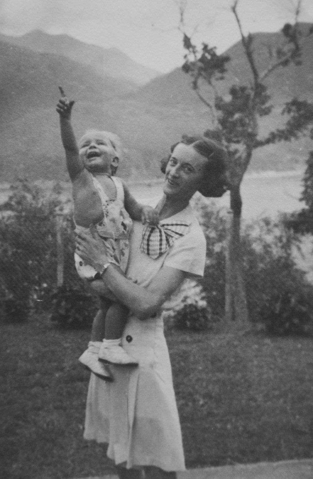 A young Jim Flegg in his mother’s arms in the garden of the cottage at Tai Tam Tuk, on the south side of Hong Kong Island, circa 1939. Picture: courtesy of Dr Jim Flegg