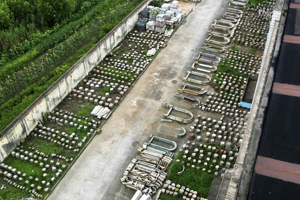 Parts of the antique villas are laid out awaiting reconstruction at the Amanyangyun, in 2015.