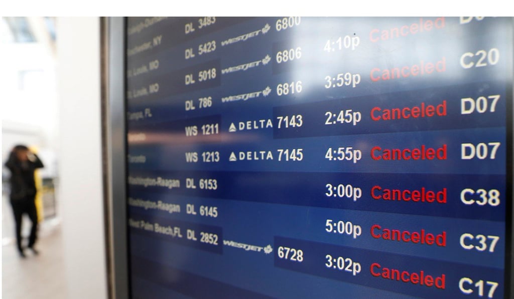 Cancelled flights are seen on a display in the Delta Air Lines terminal at LaGuardia Airport in New York Photo: Reuters