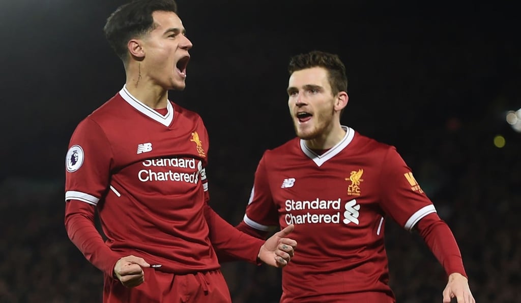 Philippe Coutinho (left) celebrates a goal. Philippe Coutinho (left) celebrates a goal.