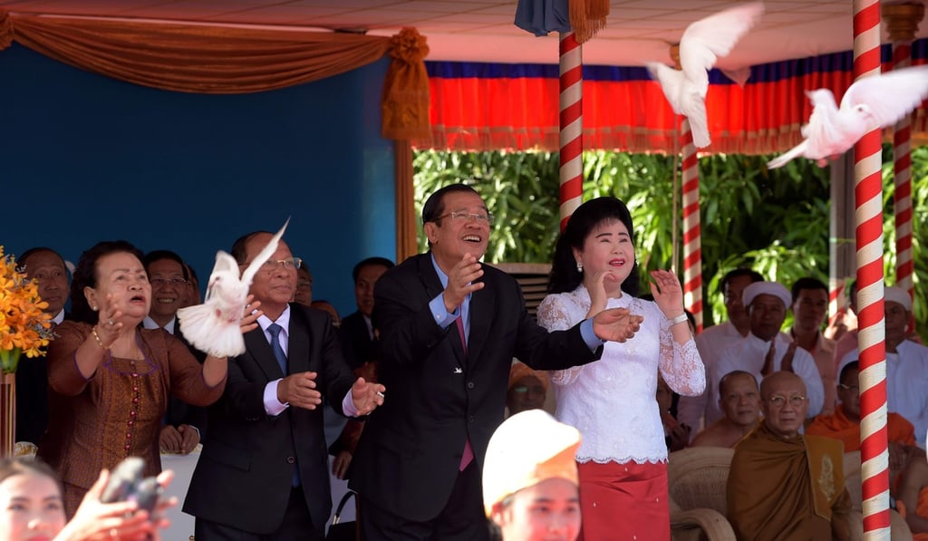 Hun Sen and his wife Bun Rany release birds during the ceremony marking the 39th anniversary of the fall of the Khmer Rouge. Photo: AFP Hun Sen and his wife Bun Rany release birds during the ceremony marking the 39th anniversary of the fall of the Khmer Rouge. Photo: AFP