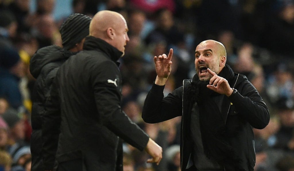 Guardiola gestures to Burnley's manager Sean Dyche during City’s win at the Etihad Stadium in Manchester. Photo: AFP Guardiola gestures to Burnley's manager Sean Dyche during City’s win at the Etihad Stadium in Manchester. Photo: AFP