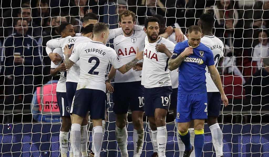 Tottenham's Harry Kane celebrates after scoring his team's first goal during the English FA Cup third round match against AFC Wimbledon. Photo: AP Tottenham's Harry Kane celebrates after scoring his team's first goal during the English FA Cup third round match against AFC Wimbledon. Photo: AP