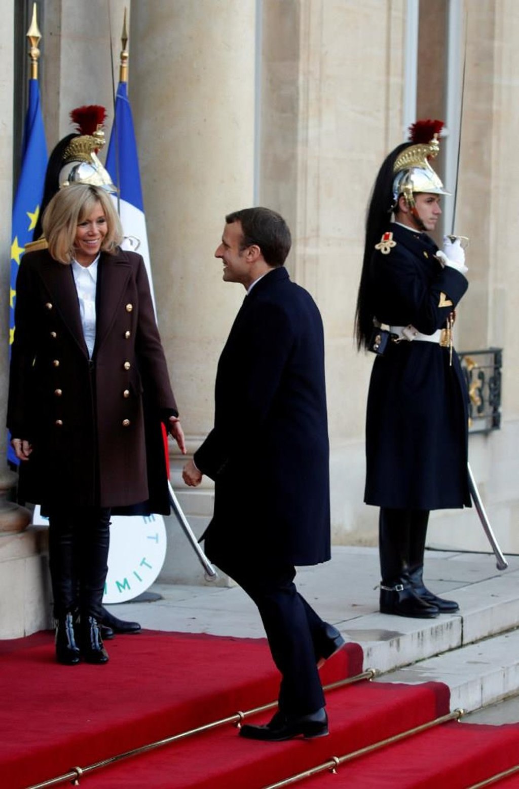 French President Emmanuel Macron and his wife Brigitte Macron welcome guests for a lunch at the Elysee Palace as part of the One Planet Summit in Paris. Photo: ReutersPhilippe Wojazer