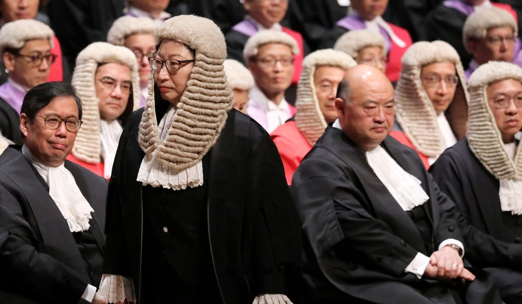 Secretary for Justice Teresa Cheng stands to give her address at the ceremonial opening of the legal year on Monday. Photo: Sam Tsang
