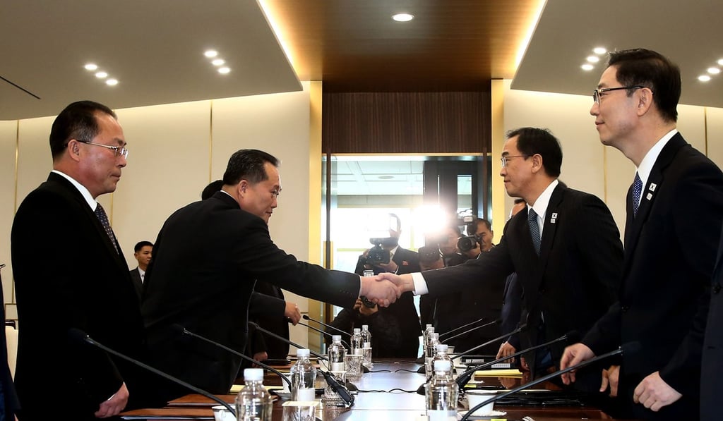 South Korea Unification Minister Cho Myung-gyun (second right) shakes hands with North Korean chief delegate Ri Son-gwon (second left) during their meeting at the border truce village of Panmunjeom in the demilitarised zone on Tuesday. Photo: Agence France-Presse South Korea Unification Minister Cho Myung-gyun (second right) shakes hands with North Korean chief delegate Ri Son-gwon (second left) during their meeting at the border truce village of Panmunjeom in the demilitarised zone on Tuesday. Photo: Agence France-Presse