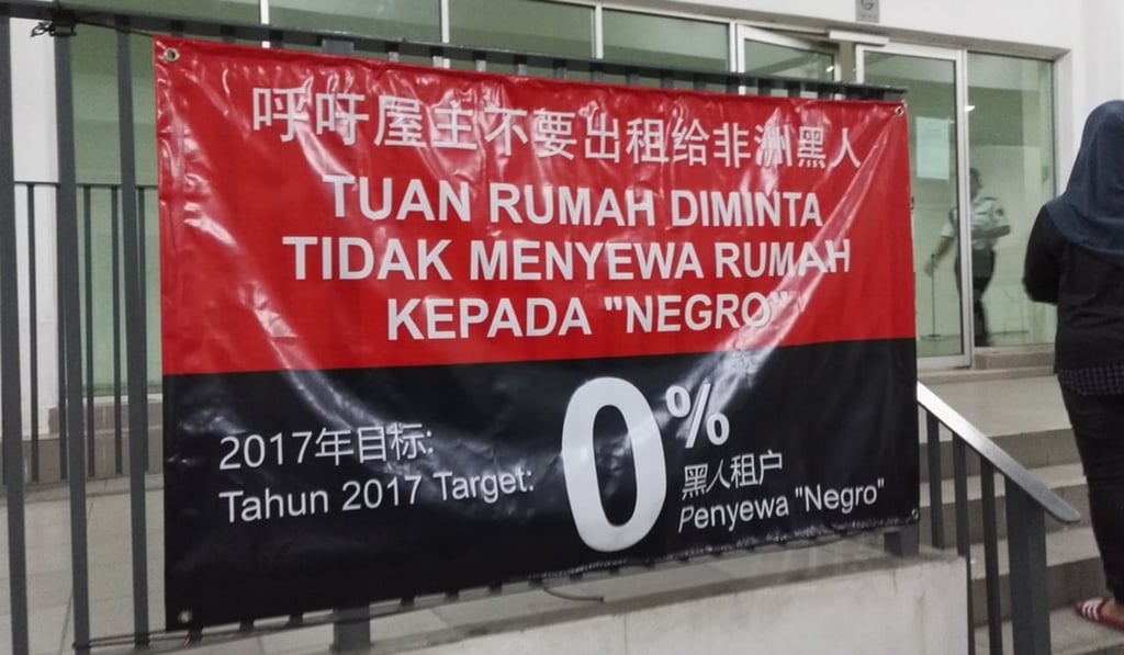 An offensive banner in a Malaysian condominium development urging landlords not to rent to black people. It says the goal for 2017 is to have zero black tenants. Photo: Ed Stevens/Reddit