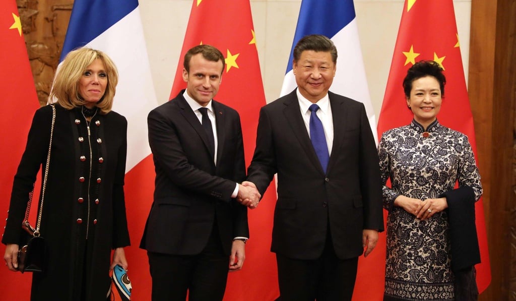 French first lady Brigitte Macron chose a simple, understated look for the first meeting of her and her husband, French President Emmanuel Macron, with Chinese President Xi Jinping and his wife, Peng Liyuan, this week. Photo: AFP/Pool French first lady Brigitte Macron chose a simple, understated look for the first meeting of her and her husband, French President Emmanuel Macron, with Chinese President Xi Jinping and his wife, Peng Liyuan, this week. Photo: AFP/Pool