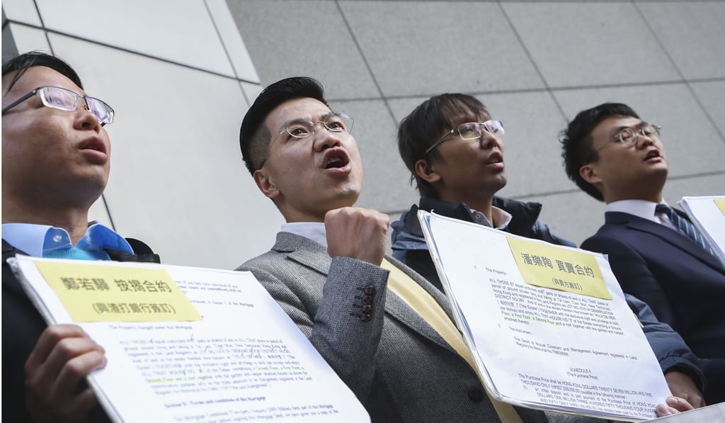 NeoDemocrat politicians file a report at police headquarters in Wan Chai on Friday accusing Cheng of keeping the basement off the books to secure mortgage loans from a bank in 2008. Photo: Edward Wong