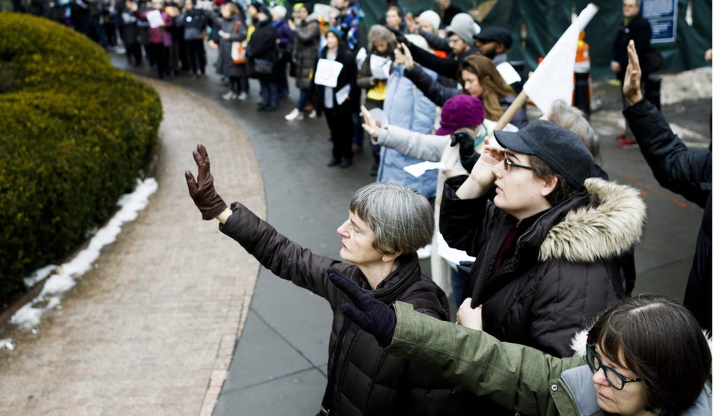 Members of an interfaith group pray during a protest in New York against the US government’s enforcement of immigration laws and deportation policies, on January 11. Debates on immigration have returned to the forefront of political discussion, drawing accusations of xenophobia and racism. Photo: EPA-EFE