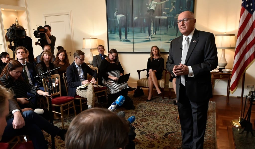 US Ambassador to The Netherlands, Peter Hoekstra (right) gestures as he speaks during a heated press conference at the US embassy, in The Hague, on Wednesday. Photo: Agence France-Presse